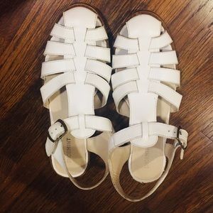 white closed toe sandals with buckle